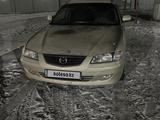Mazda 626 1999 года за 2 650 000 тг. в Актобе – фото 2