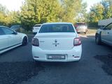Renault Logan 2015 года за 1 800 000 тг. в Караганда – фото 4