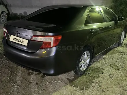 Toyota Camry 2014 года за 7 400 000 тг. в Жанаозен – фото 11