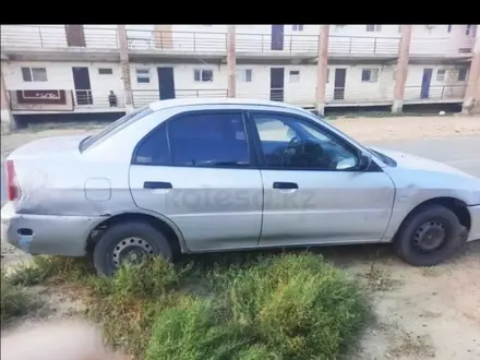 Mitsubishi Mirage 2001 года за 350 000 тг. в Алматы – фото 3