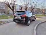 Nissan X-Trail 2014 года за 8 850 000 тг. в Астана – фото 2