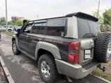 Nissan Patrol 2005 года за 12 500 000 тг. в Астана – фото 2