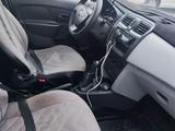 Renault Logan 2014 года за 2 300 000 тг. в Кызылорда – фото 4