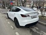 Tesla Model Y 2023 года за 17 999 000 тг. в Алматы – фото 4