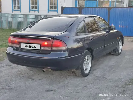Mazda 626 1994 годаүшін1 050 000 тг. в Петропавловск – фото 4
