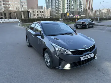 Kia Rio 2021 года за 8 100 000 тг. в Астана