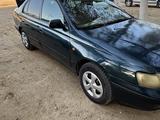 Toyota Carina E 1997 годаүшін950 000 тг. в Байконыр – фото 2