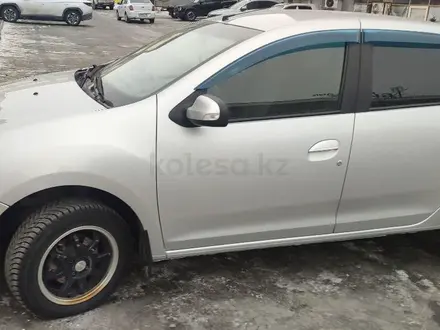 Renault Logan 2014 года за 3 300 000 тг. в Усть-Каменогорск – фото 3