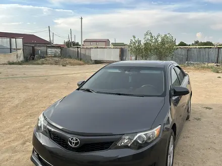 Toyota Camry 2012 года за 8 200 000 тг. в Атырау