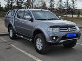 Mitsubishi L200 2013 года за 12 000 000 тг. в Астана