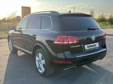 Volkswagen Touareg 2012 года за 10 500 000 тг. в Астана – фото 5