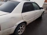 Mazda Familia 1999 года за 35 000 тг. в Астана – фото 3