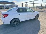 Renault Logan 2015 года за 2 500 000 тг. в Балхаш – фото 3
