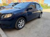 Renault Logan 2015 года за 2 900 000 тг. в Актобе – фото 2