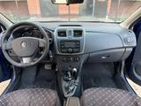 Renault Logan 2015 года за 2 900 000 тг. в Актобе – фото 5