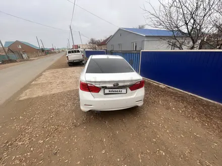 Toyota Camry 2014 года за 8 500 000 тг. в Атырау