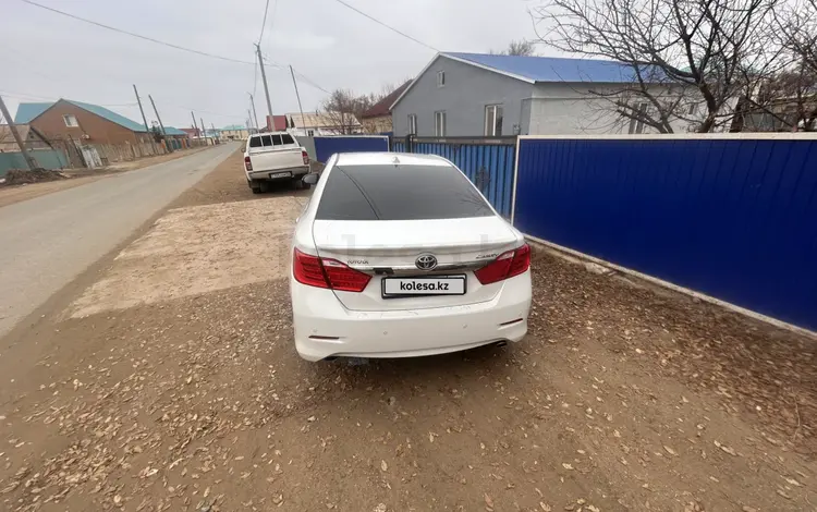Toyota Camry 2014 года за 8 500 000 тг. в Атырау