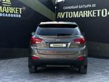 Hyundai Tucson 2013 годаүшін5 800 000 тг. в Актобе – фото 5