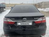 Toyota Camry 2016 года за 10 500 000 тг. в Кульсары – фото 2