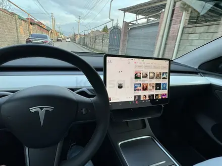 Tesla Model Y 2023 года за 21 500 000 тг. в Алматы – фото 11