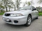 Mitsubishi Carisma 1997 годаүшін1 700 000 тг. в Шымкент