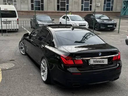 BMW 750 2012 года за 13 000 000 тг. в Алматы – фото 4