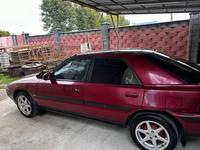 Mazda 323 1994 годаүшін1 300 000 тг. в Алматы