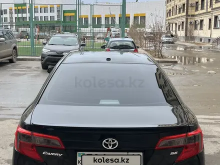 Toyota Camry 2012 года за 8 700 000 тг. в Жанаозен