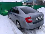 Skoda Rapid 2013 года за 3 500 000 тг. в Аксай