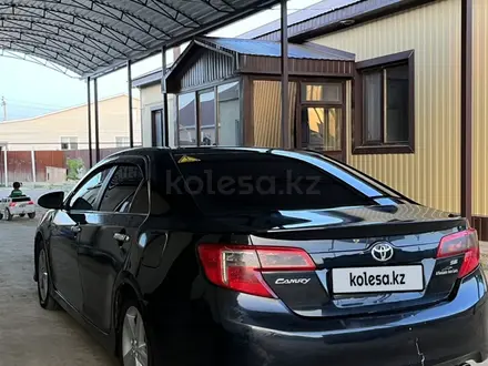 Toyota Camry 2014 года за 6 500 000 тг. в Актобе – фото 6