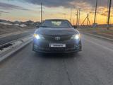 Toyota Camry 2013 года за 6 990 000 тг. в Актобе
