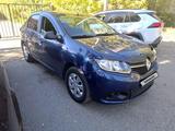 Renault Logan 2014 года за 1 800 000 тг. в Усть-Каменогорск – фото 2
