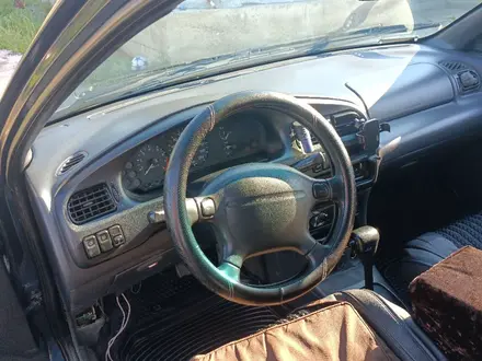 Mazda 323 1995 года за 1 300 000 тг. в Усть-Каменогорск – фото 12