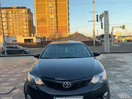 Toyota Camry 2013 года за 8 000 000 тг. в Атырау