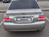 Mitsubishi Lancer 2006 года за 2 500 000 тг. в Астана – фото 4