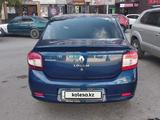 Renault Logan 2014 года за 2 200 000 тг. в Караганда – фото 2