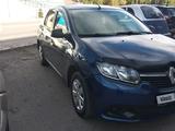 Renault Logan 2014 года за 2 200 000 тг. в Караганда – фото 3