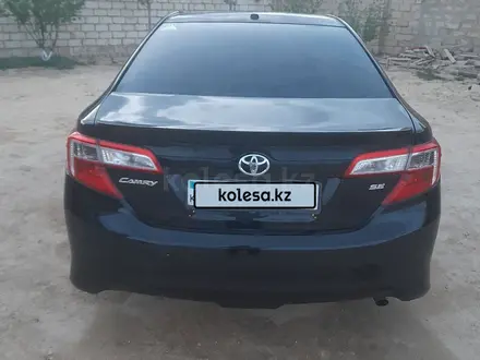 Toyota Camry 2012 года за 8 200 000 тг. в Жанаозен – фото 2