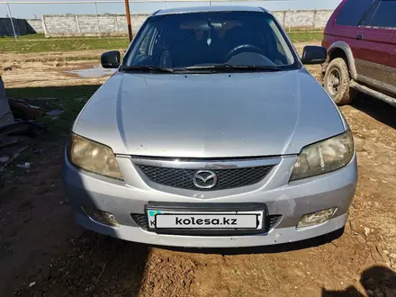 Mazda 323 2003 года за 2 000 000 тг. в Алматы – фото 10