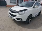 Hyundai Tucson 2012 года за 8 100 000 тг. в Атырау – фото 2