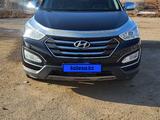 Hyundai Santa Fe 2013 года за 10 400 000 тг. в Актобе