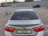 Toyota Camry 2015 года за 8 000 000 тг. в Актобе – фото 4