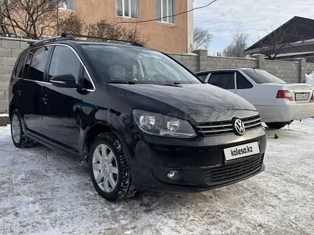 Volkswagen Touran 2018 года за 3 800 000 тг. в Алматы – фото 2