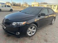 Toyota Camry 2013 года за 7 300 000 тг. в Актобе