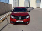Renault Logan 2014 года за 3 900 000 тг. в Астана – фото 2