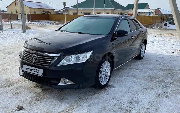 Toyota Camry 2014 годаfor8 150 000 тг. в Атырау