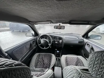 Nissan Primera 1997 года за 750 000 тг. в Актобе – фото 7