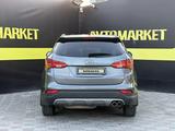 Hyundai Santa Fe 2014 годаүшін8 500 000 тг. в Актобе – фото 5