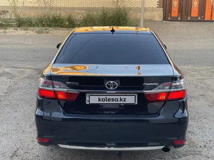 Toyota Camry 2014 года за 11 500 000 тг. в Кызылорда – фото 4
