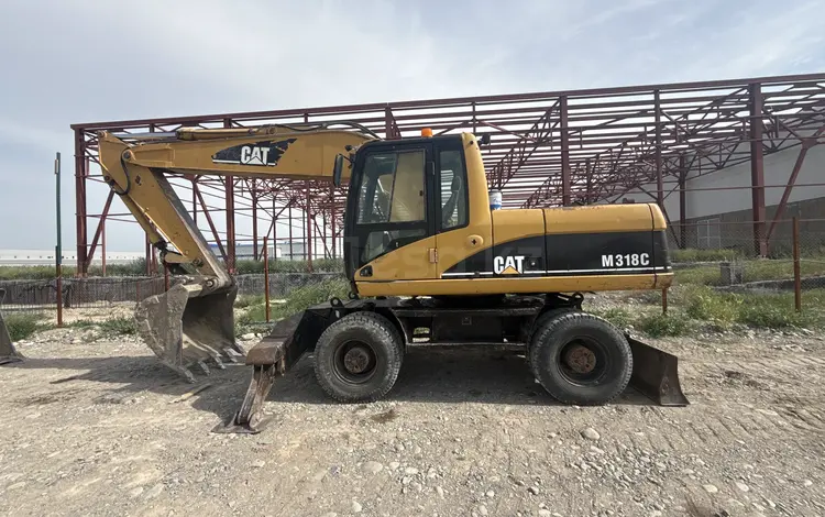 Caterpillar  318 2006 года за 20 000 000 тг. в Алматы
